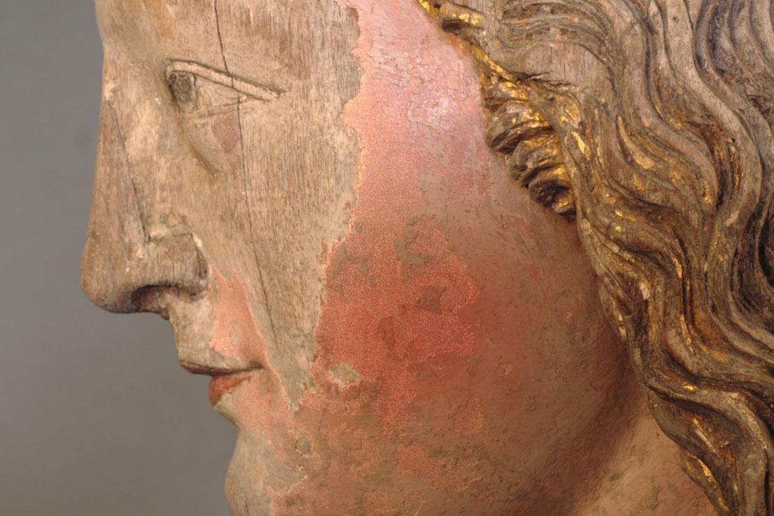 Detail of Mary's head with carefully retouched with leftover paint