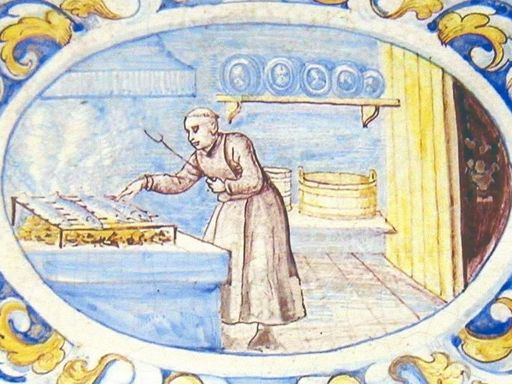 Kloster und Schloss Salem, Detail des Kachelofens im Speisesaal, Mönch beim Braten von Fisch 