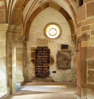 Door of the dead in the south transept at Maulbronn Monastery