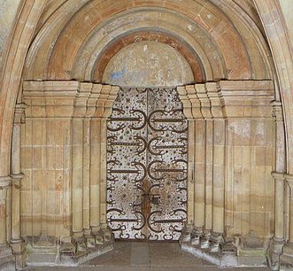 Main entrance to Maulbronn Monastery's church, with ornamental mountings